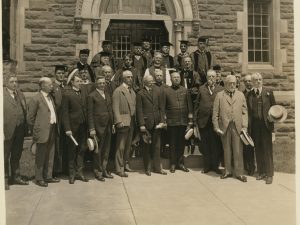 Recipients of honorary degrees, trustees, and guests, photographed at the entrance to Williams Memorial (left to right, top to bottom): Flavel S. Luther, Theodore Roosevelt, Russell Jordan Coles, Bishop Paul Matthews, George Wharton Pepper, John Pierpont Morgan, George Shiras, Charles Lathrop Pack, Karl Reiland, Bishop Granville Hudson Sherwood, Edward Schofield Travers, Charles A. Johnson, W. S. Hubbard, N. H. Batchelder, Charles G. Woodward; William B. Davis, Mus.B.; Frank L. Wilcox; Edgar F. Waterman; George D. Howell, William G. Mather, Meigs H. Whaples, Admiral William S. Cowles, William S. Cogswell, William E. Curtis, A.S. Murray Jr, Shiras Morris, John P. Elton, Joseph Buffington (Trinity College, Hartford Connecticut)