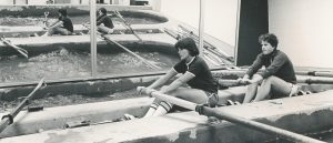 Women's crew practicing in the rowing tanks, 1970s.