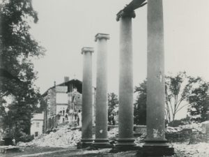 Trinity College Old Campus, View from northeast of demolition of Jarvis Hall (1825-1878) and Seabury Hall (1825-1878) [note on photo: No. 49 of set of stereo views of Hartford published by W.N. Cooms, Hartford] CREATOR Cooms, W. N. (photographer, American, act. 1878)