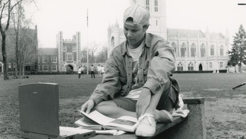 Trinity College student with Power Book laptop on Main Quad, 1995.