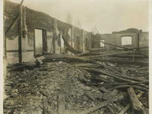 Alumni Hall, rubble after Feb. 18, 1922 fire.