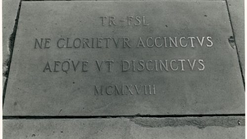 Plaque on Long Walk commemmorating the honorary degree awarded Theodore Roosevelt by Flavel Sweeten Luther. (Photographer unknown, 1919)