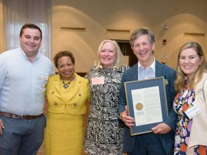 Joining Daniel Korengold ’73, P’09, ’12, ’14, ’18 (holding his award citation) during the Class of 1973’s 50th Reunion dinner are, from left, Steven Armanetti ’18, Trinity President Joanne Berger-Sweeney, Martha Dippell P’09, ’12, ’14, ’18, and Hannah “Greer” Korengold ’18