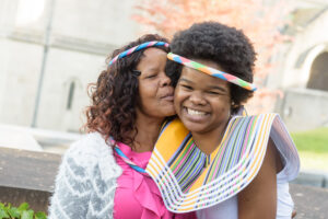 An international trinity college student with their family