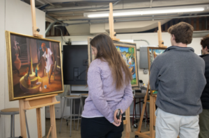 First year seminar’s students engaging with the The Edith A. Graham Collection of Haitian Art at Trinity College.