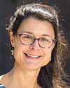 Photo of Laura Holt with dark hair and glasses