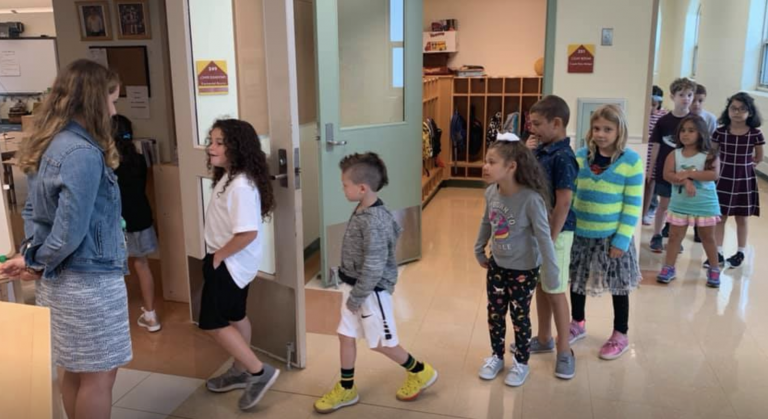 Brigit Rioual and Montessori Magnet students on first day of school