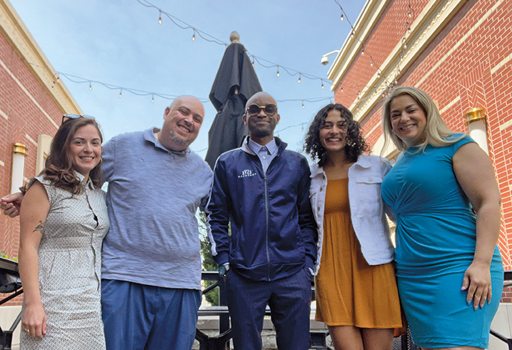 Aarti Lamberg ’24 (second from right) with Greater Hartford Legal Aid immigration team attorneys Lisa Herrera, Michael Ravelo (Lamberg’s internship supervisor), Ryan Powell, and Enelsa Díaz