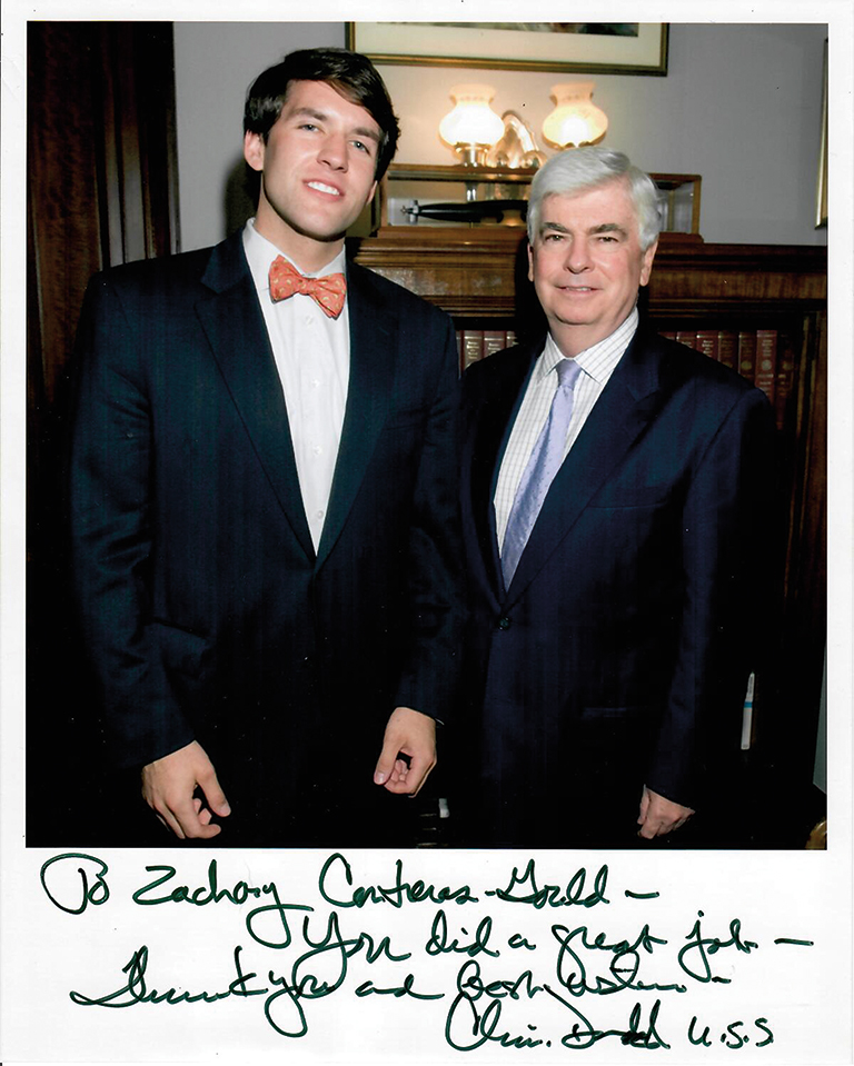 Zachary Logan Gould ’07 in an autographed photo from his 2006 Washington D.C. internship with Connecticut Senator Christopher J. Dodd