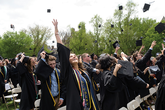 The traditional celebratory cap toss