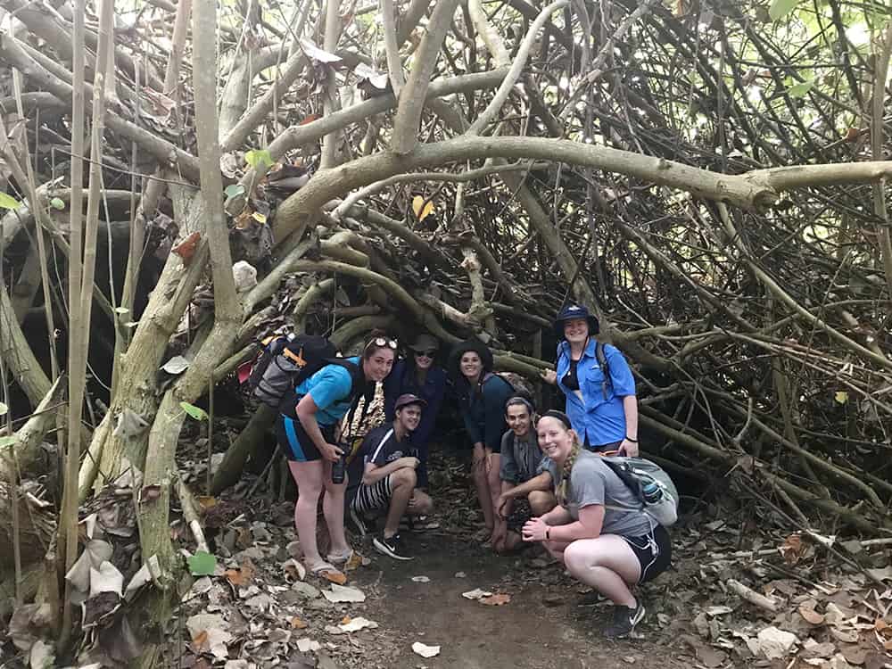 students in a grove