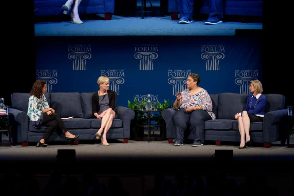 Panelists on stage at Connecticut Forum