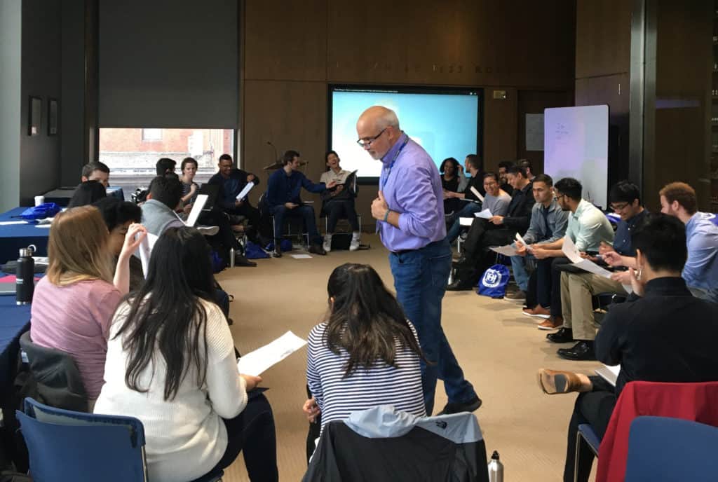 Members of an Infosys Business Analysis for Digital Transformation Program cohort take part in a training session in Trinity’s Raether Library and Information Technology Center.