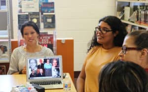 Josselyn Alejandra Zaldívar ’20 presents on the Voices of Migration project at the Hartford Public Library Park Street branch in 2019.