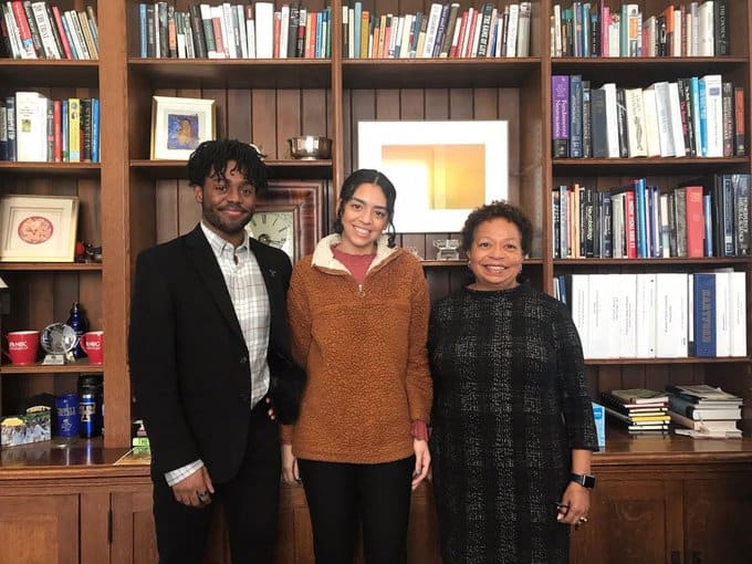 Trinity College President Joanne Berger-Sweeney (right) with Darius Borges ’20 (left) and Ailani Cruceta ’22, who are also quoted in the Hartford Courant article.