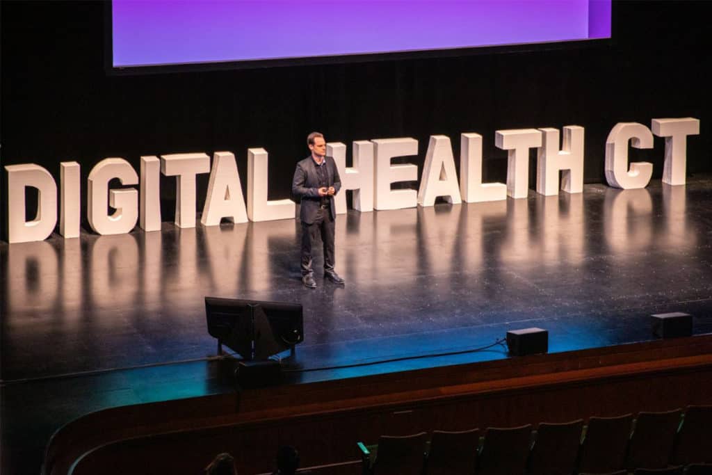 MDI Health co-founder and CEO Avishai Ben-Tovim pitches to the crowded Belding Theater at the Bushnell.