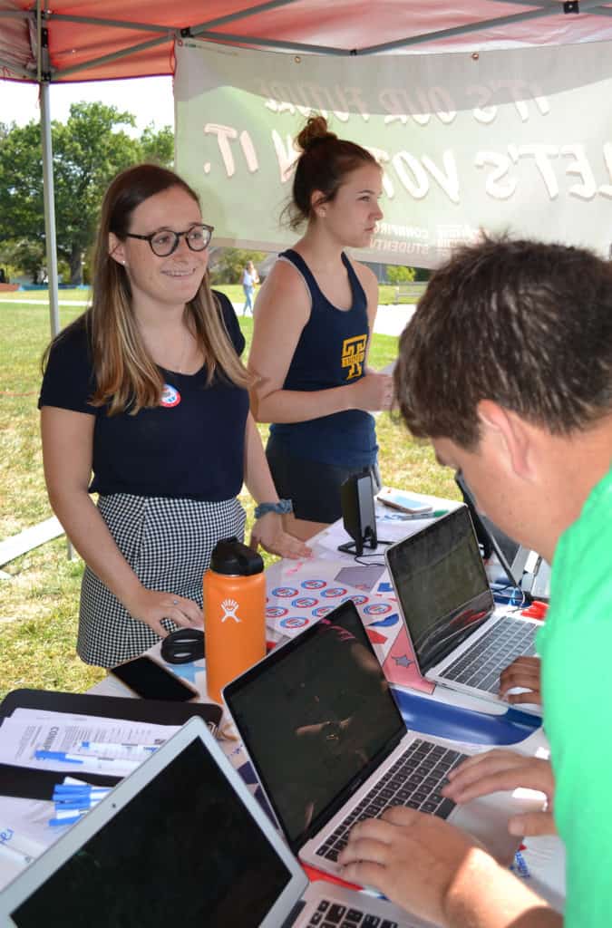 Maddy White ’22 (left) leads a ConnPIRG Voter Registration Day event at Trinity in September 2019.