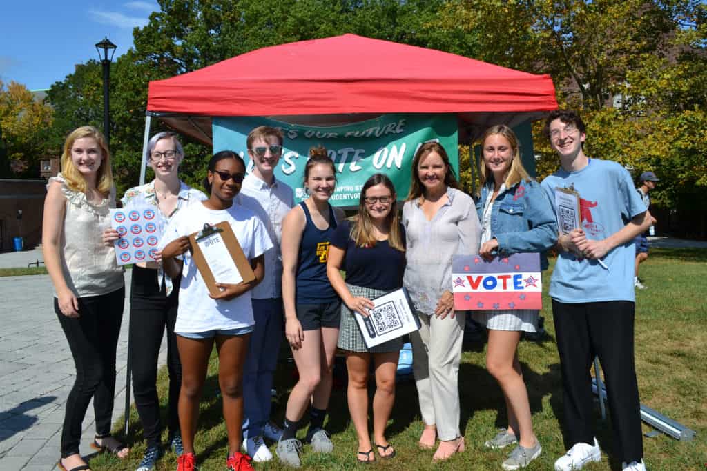 Secretary of the State Denise W. Merrill with Trinity students during ConnPIRG's Voter Registration Day event on the Gates Quad in September 2019.