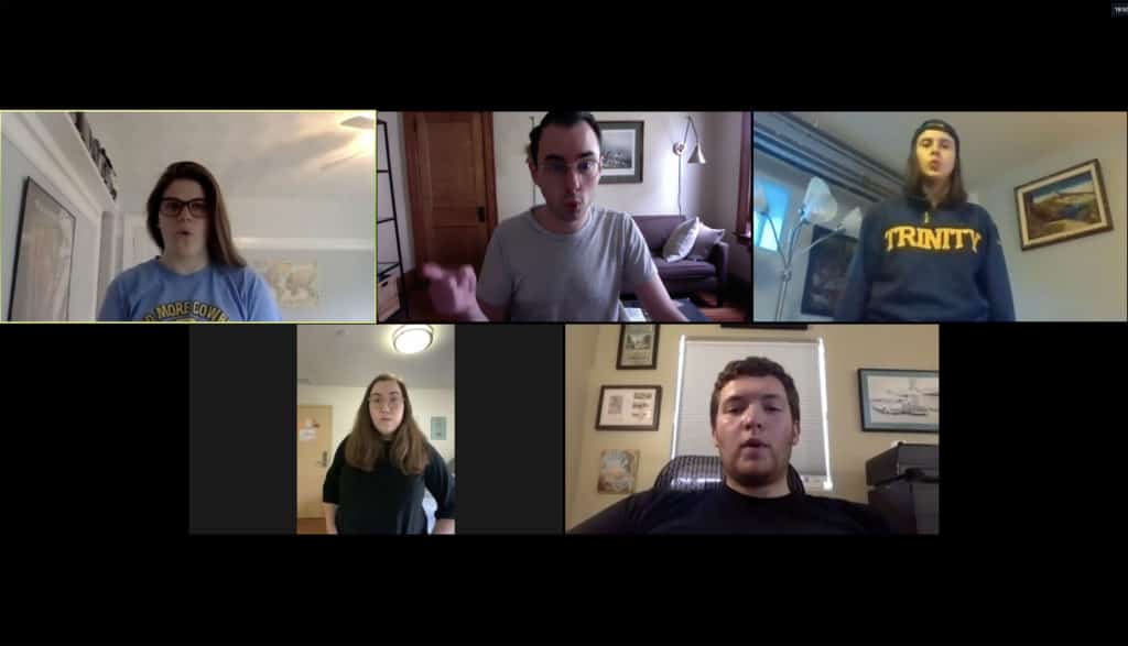 Christopher Houlihan ’09 (top, center) conducts a rehearsal of the Chapel Singers via Zoom.