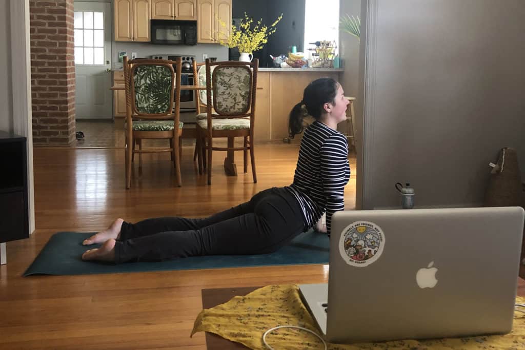 Gabby Nelson, program coordinator for Trinity’s Center for Urban and Global Studies, conducts a virtual yoga class.