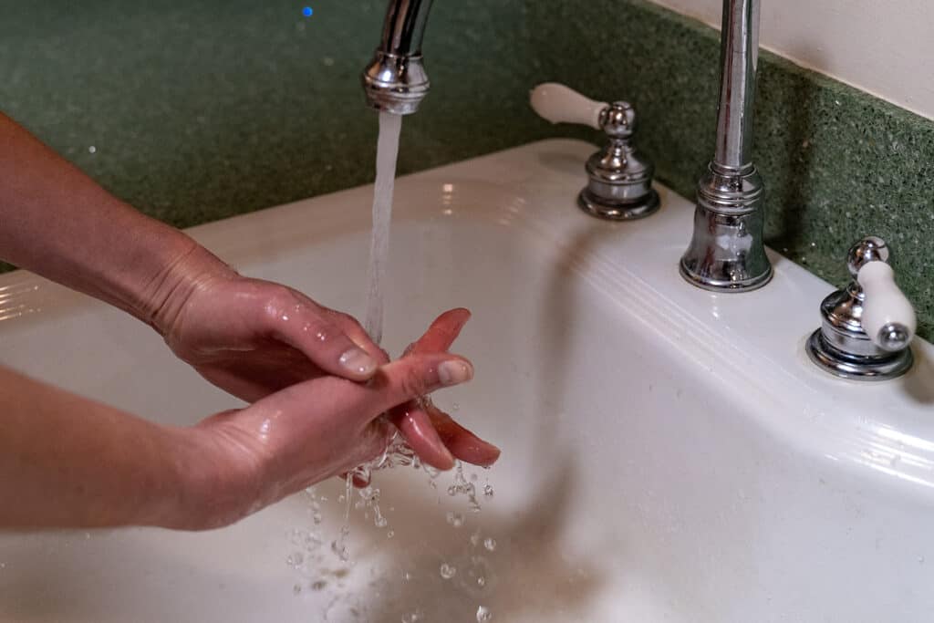 handwashing Economics thesis fall 2020 COVID stock photo