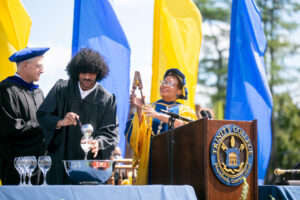 DiChristina, SGA President Jederick Estrella '22, and President Berger-Sweeney conclude the ceremony with the traditional lemonade toast.