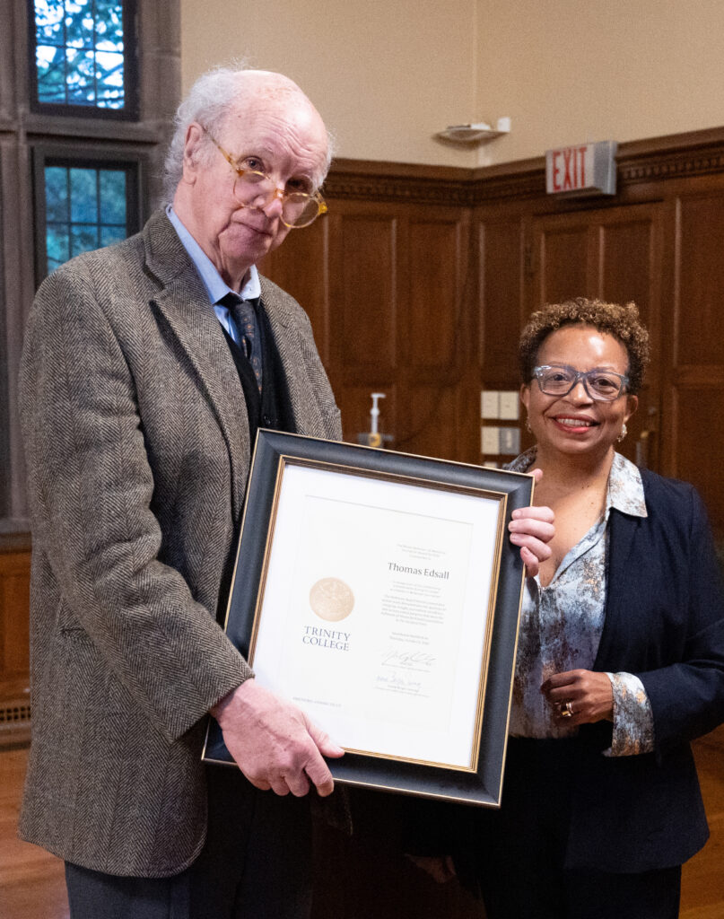 Trinity College President Joanne Berger-Sweeney presents Thomas B. Edsall with the Moses Berkman Memorial Journalism Award.
