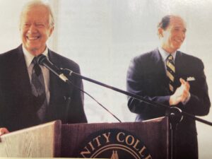 Former President Jimmy Carter jokes with then-Trinity President Evan Dobelle H’01 at the campus luncheon preceding Commencement. Dobelle served in Carter's administration as U.S. Chief of Protocol and Assistant Secretary of State.