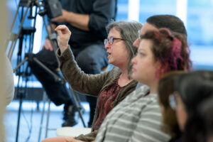 Audience members ask questions during the 2023 Shirley G. Wassong Lecture "Made You Look: Attention, Perception, and Your Lived Experience."