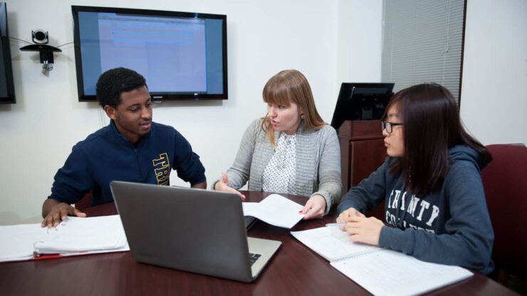 Associate Professor of Computer Science Ewa Syta works with students. 