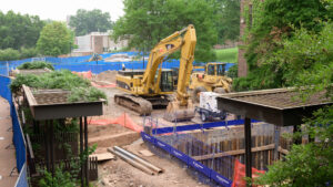 Heavy machinery digs a hole