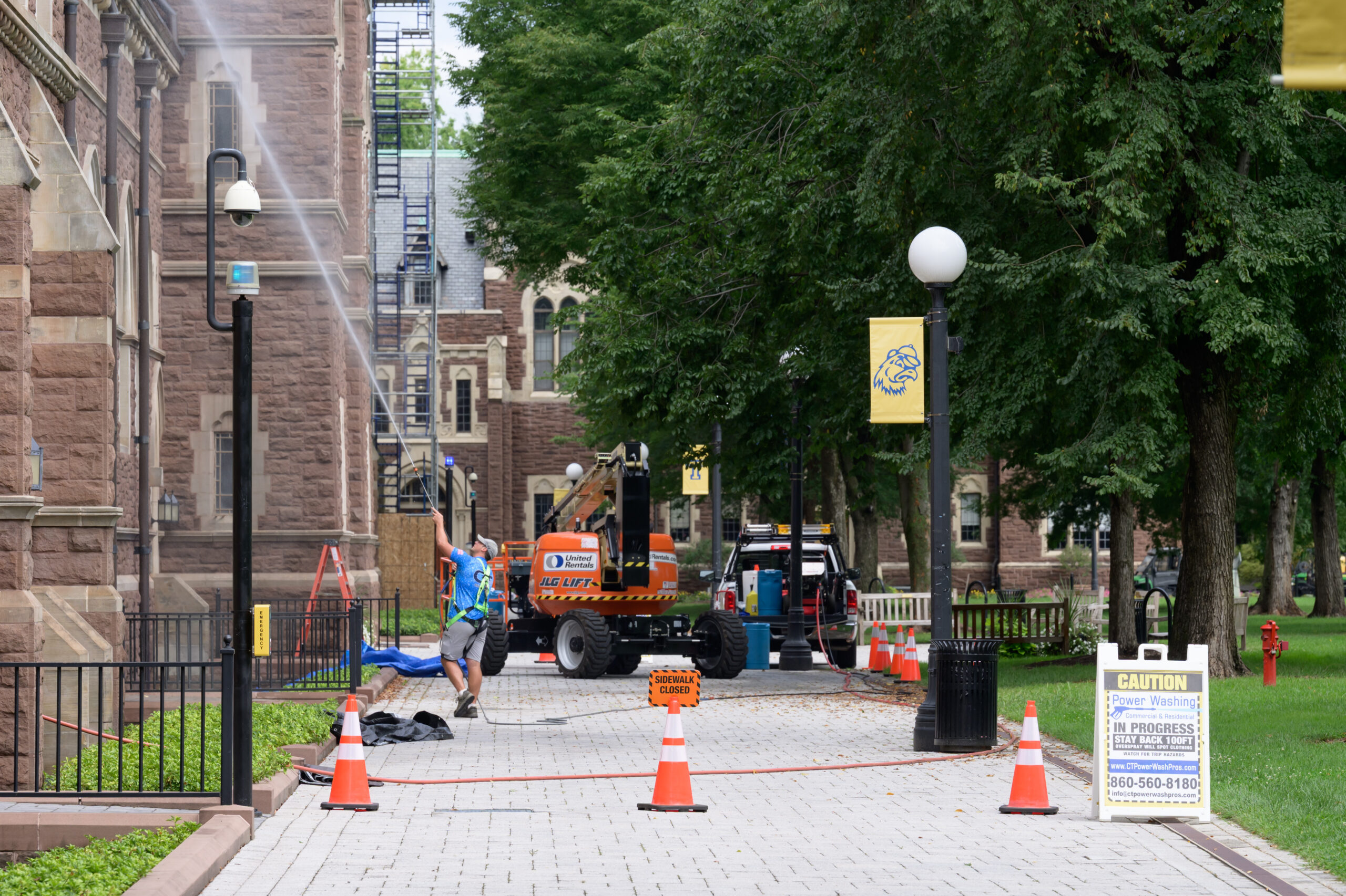 Heavy machinery digging a big hole in order for a pipe to be repaired.